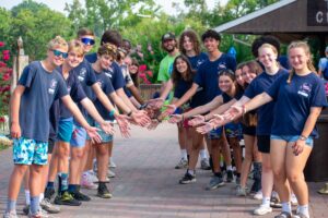 Camp team welcoming new camper