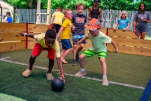 Children playing sports at Liberty Lake Day Camp